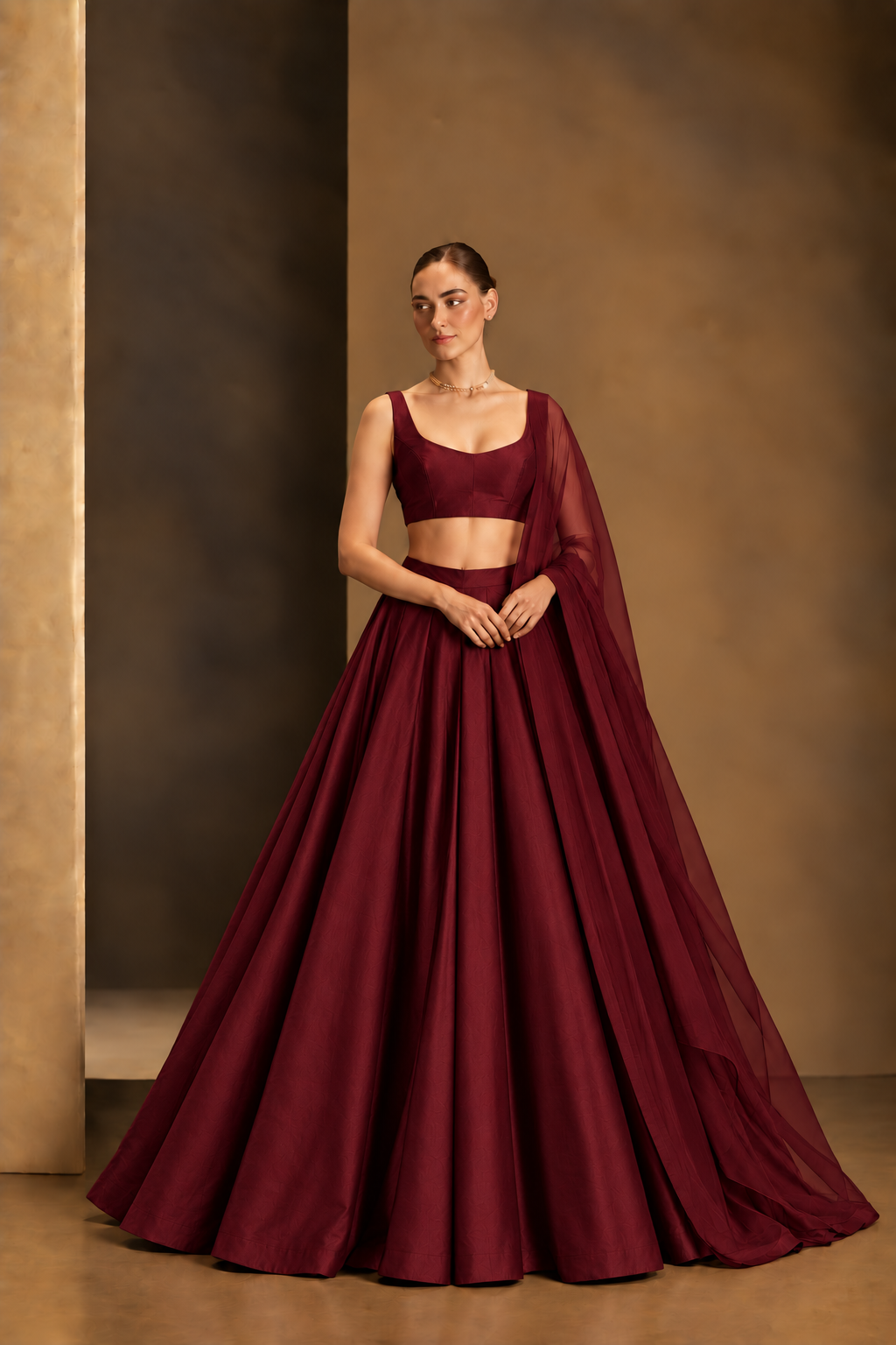 Deep Wine Maroon plain lehenga with sleeveless choli and matching sheer dupatta