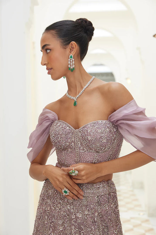 Zaar mauve net embellished lehenga by WellGroomed