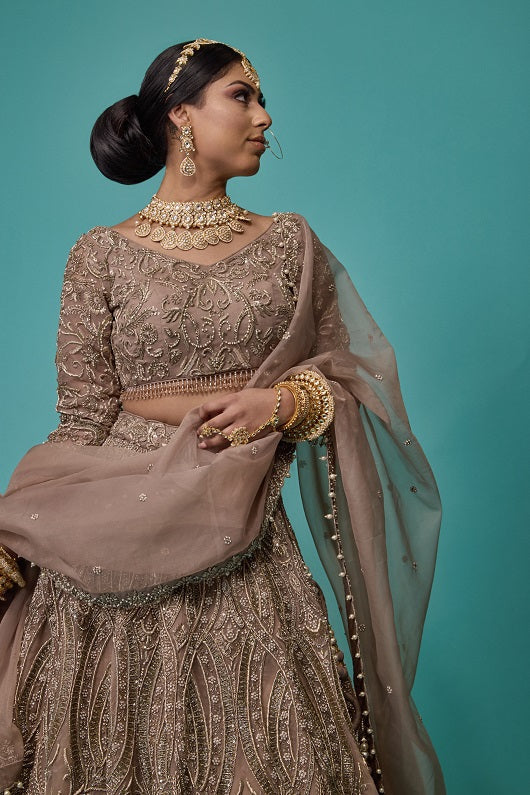 Somya mauve organza reception lehenga by WellGroomed