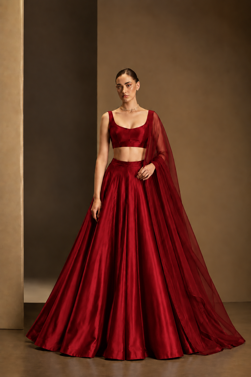 Deep Red plain lehenga with sleeveless choli and matching sheer dupatta