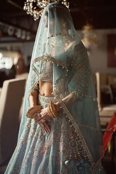 Mira sky blue Zardozi reception lehenga by WellGroomed