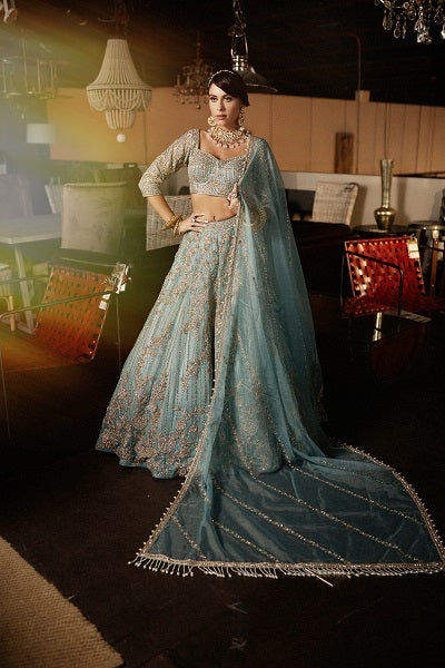 Mira sky blue Zardozi reception lehenga by WellGroomed